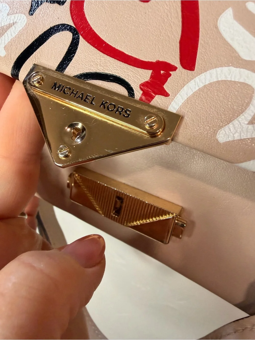 Michael Kors used marks mild
